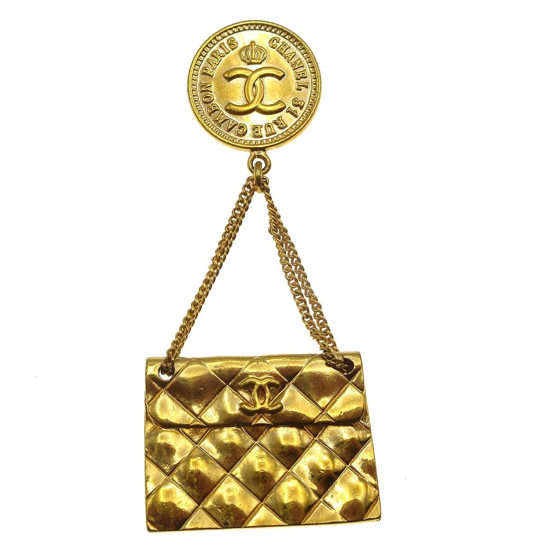 Chanel Gold-Plated Bag Brooch Pin 93P Vintage Accessory: Chanel Gold-Plated Bag Brooch Pin 93P Vintage Accessory This exquisite Chanel brooch pin is a stunning addition to any accessory collection. Crafted from gold-plated material, it showcases a beautiful