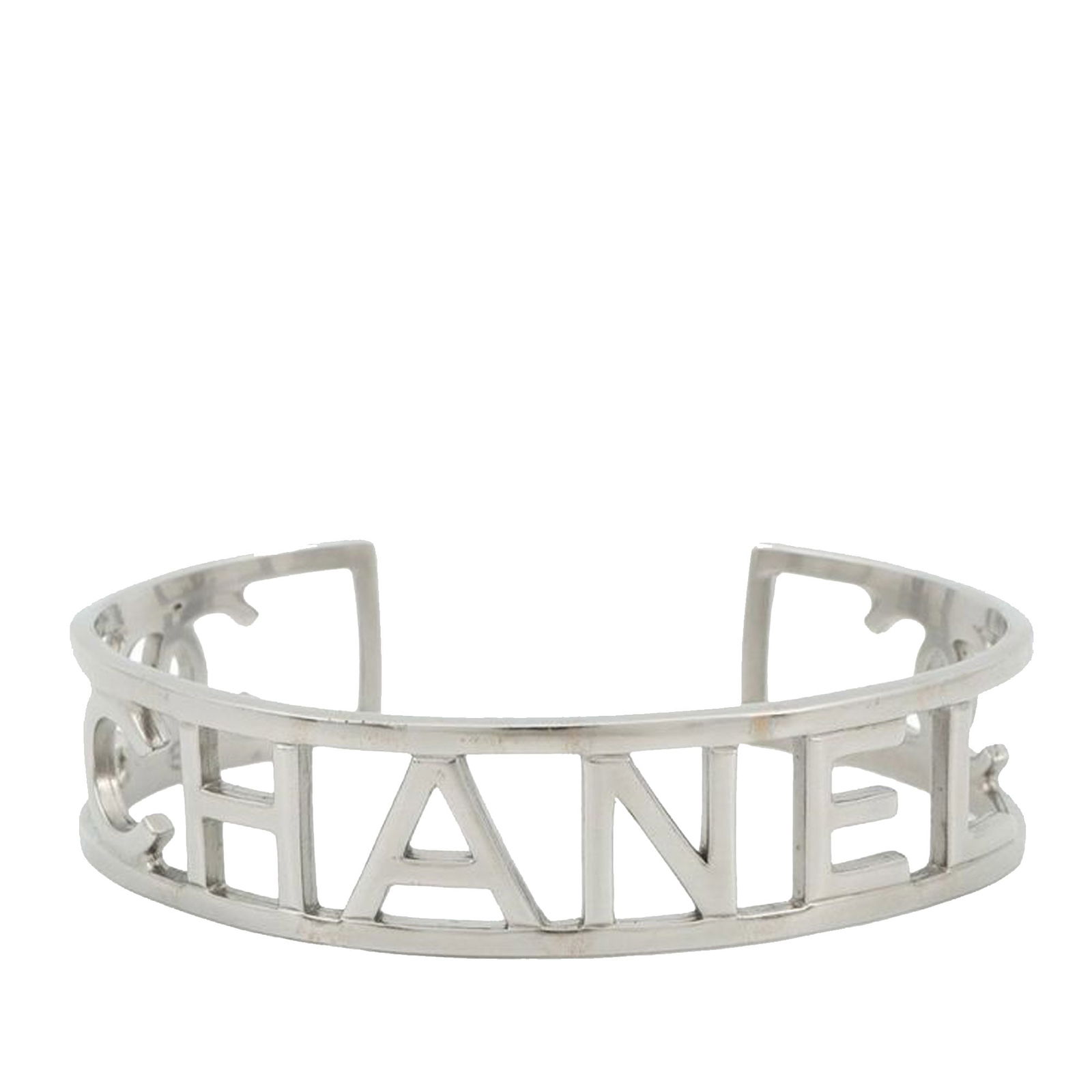 Chanel Silver Tone Metal Cuff Bracelet with Cutout Logo Design: Chanel Silver Tone Metal Cuff Bracelet with Cutout Logo Design This Chanel cuff bracelet showcases a distinctive cutout logo design crafted from silver-plated metal. The piece is categorized as costum