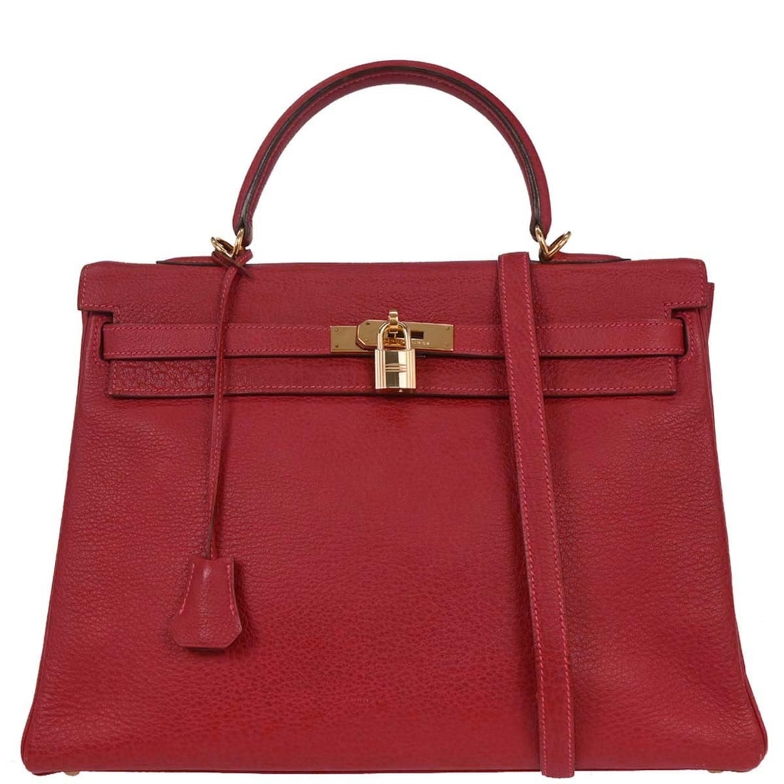 Red Hermes Kelly Bag Pre-Owned: Red Hermes Kelly Bag Pre-Owned This pre-owned Hermes Kelly handbag features a striking red color and is designed for women. The bag is in good overall condition with some scuffs on the edges, while th