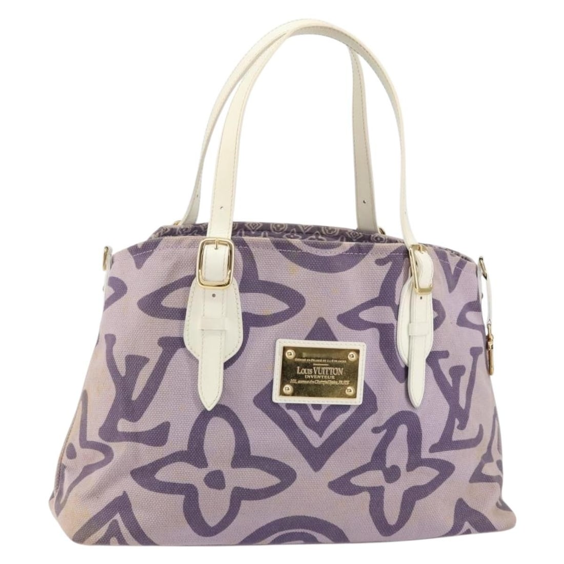 Tahitienne Cabas Tote Bag by Louis Vuitton in Purple: Tahitienne Cabas Tote Bag by Louis Vuitton in Purple This pre-owned Louis Vuitton Tahitienne Cabas tote bag comes in a purple hue and is designed for women. The bag is in good condition, displaying si