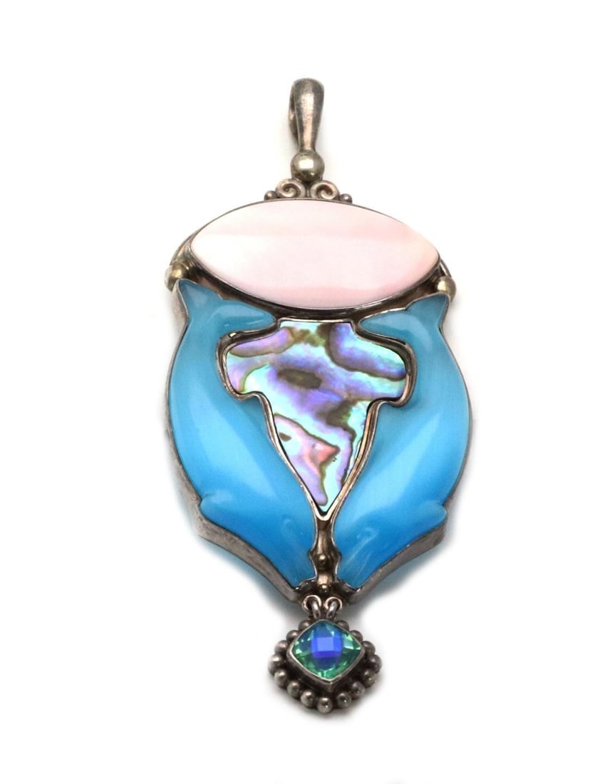 Sajen Sterling Silver Dolphin Pendant with Multicolor Gems: Sajen Sterling Silver Dolphin Pendant with Multicolor Gems This stunning large pendant showcases exquisite craftsmanship in sterling silver, featuring a vibrant pink stone at the top. The design inclu