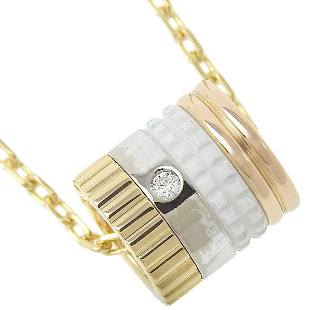 Quatre Classic Gold Pendant Necklace by Boucheron: Quatre Classic Gold Pendant Necklace by Boucheron This Boucheron Quatre Classic pendant necklace is designed for women. It is in excellent condition, showing only minor scratches and slight dullness.