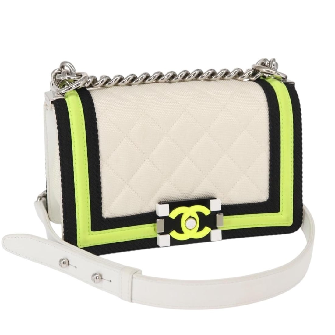 White Fluo Boy Shoulder Bag by Chanel: White Fluo Boy Shoulder Bag by Chanel This pre-owned Chanel Fluo Boy Flap Bag in white features a clean exterior with no notable scratches and corners in excellent condition. The interior displays som