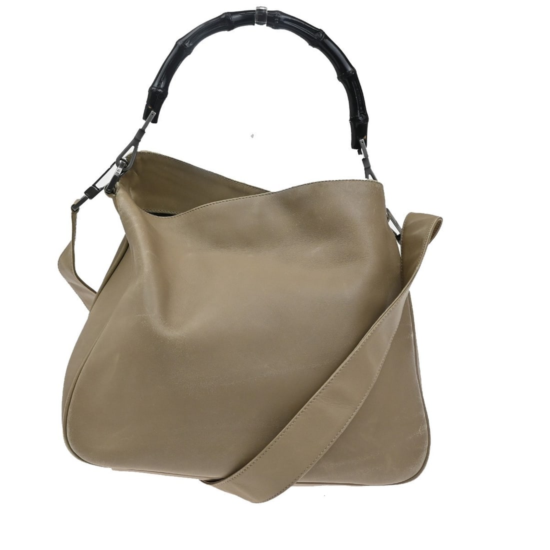 Beige Bamboo Handle Hobo Bag by Gucci Vintage Collection: Beige Bamboo Handle Hobo Bag by Gucci Vintage Collection This pre-owned Gucci vintage bamboo handle open hobo handbag features a beige exterior and is designed for women. The bag shows noticeable sign