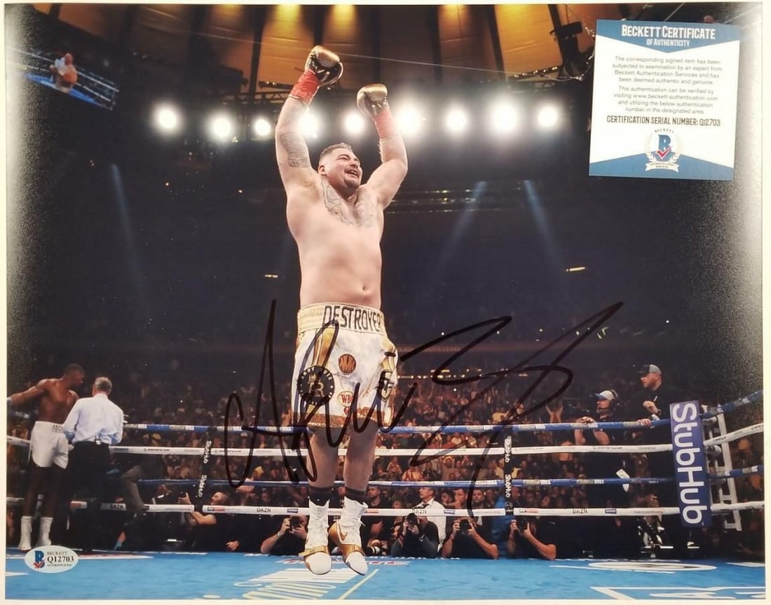 Andy Ruiz Jr Signed 11x14 Photo vs Anthony Joshua Beckett COA: Andy Ruiz Jr Signed 11x14 Photo vs Anthony Joshua Beckett COA This is an original 11x14 photo of Andy Ruiz Jr. signed during his match against Anthony Joshua. The autograph is verified with a Beckett