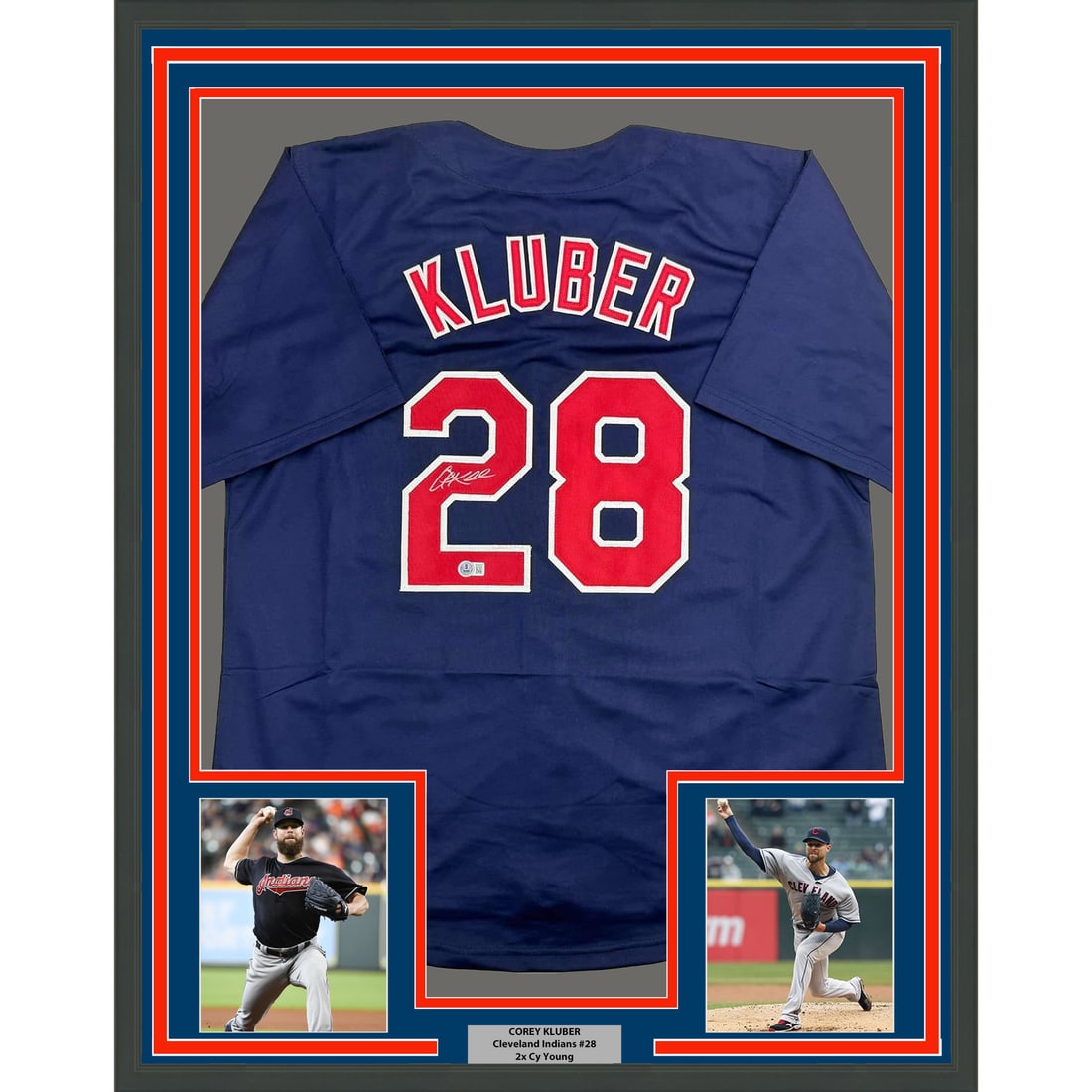 Corey Kluber Signed Cleveland Jersey Framed 35x39 With Beckett Authentication: Corey Kluber Signed Cleveland Jersey Framed 35x39 With Beckett Authentication This framed display features an autographed Corey Kluber Cleveland blue jersey. The jersey has been professionally framed