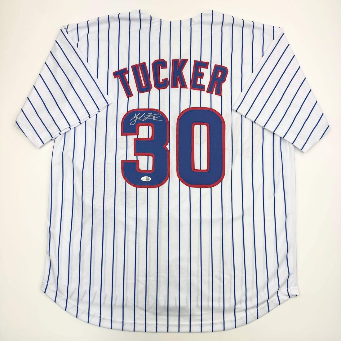 Kyle Tucker Autographed Chicago Cubs Pinstripe Jersey JSA COA: Kyle Tucker Autographed Chicago Cubs Pinstripe Jersey JSA COA Celebrate your love for baseball with this autographed Kyle Tucker Chicago Pinstripe Baseball Jersey, accompanied by a JSA Certificate of