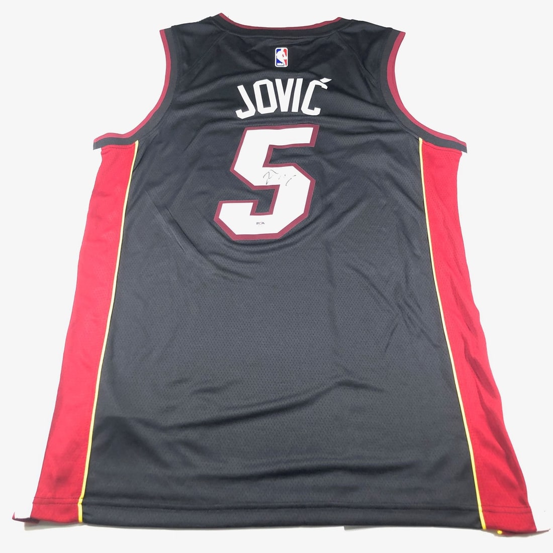 Nikola Jovic Autographed Miami Heat Jersey PSA/DNA Certified: Nikola Jovic Autographed Miami Heat Jersey PSA/DNA Certified This original Miami Heat jersey is autographed by Nikola Jovic, a promising player in the NBA. The signature has been authenticated by PSA/