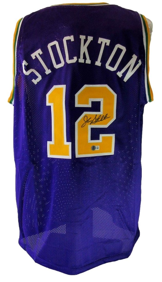Custom Purple Basketball Jersey Signed by John Stockton Hall of Fame Beckett COA: Custom Purple Basketball Jersey Signed by John Stockton Hall of Fame Beckett COA This is a purple custom basketball jersey signed by Hall of Famer John Stockton. The jersey is authenticated by Beckett