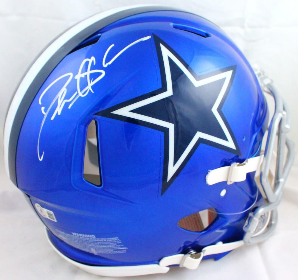 Deion Sanders Dallas Cowboys Signed Authentic Helmet Beckett Certified: Deion Sanders Dallas Cowboys Signed Authentic Helmet Beckett Certified This authentic full-size flash speed helmet is signed by Hall of Fame player Deion Sanders, a legendary figure in Dallas Cowboys