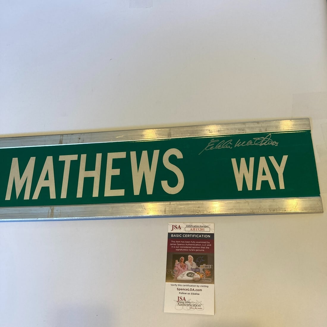 Eddie Mathews Signed 6x30 Street Sign JSA Certified: Eddie Mathews Signed 6x30 Street Sign JSA Certified Celebrate baseball history with this original, twice-signed Eddie Mathews street sign. This large double-sided sign, measuring 6x30 inches, is a stu