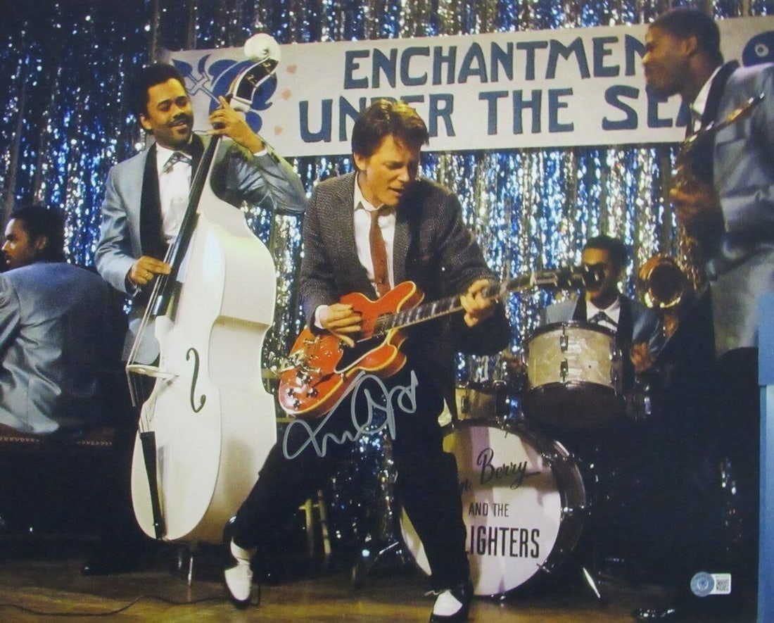 Michael J Fox Back to the Future Autographed 16x20 Photo Beckett Certified: Michael J Fox Back to the Future Autographed 16x20 Photo Beckett Certified This is a hand-signed original 16x20 photograph of Michael J. Fox from the iconic film "Back to the Future." The autograph ha