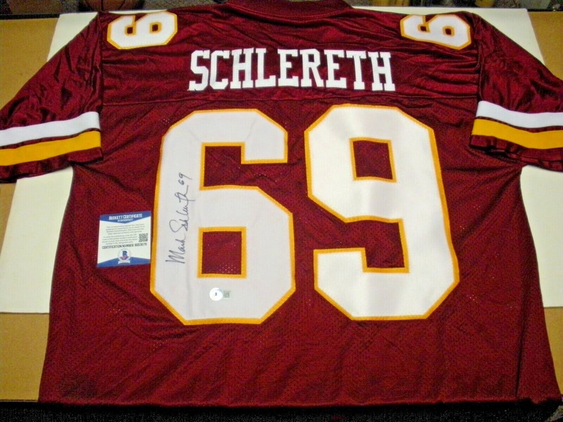 Mark Schlereth Signed Reebok Redskins Jersey with Beckett COA: Mark Schlereth Signed Reebok Redskins Jersey with Beckett COA This is an officially licensed Reebok jersey signed by Mark Schlereth, a notable player from the Washington Redskins. This original jersey