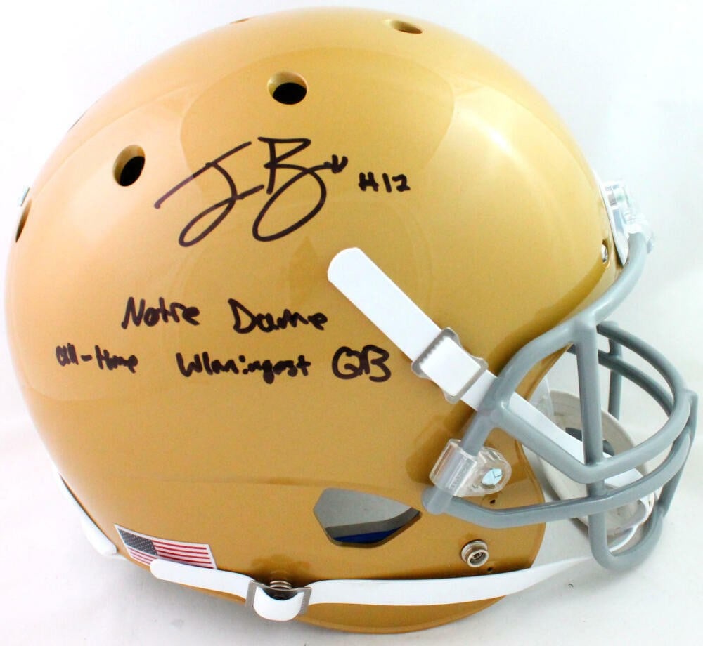 Ian Book Autographed Notre Dame Gold Speed Helmet Beckett Authenticated: Ian Book Autographed Notre Dame Gold Speed Helmet Beckett Authenticated This is an original Notre Dame Fighting Irish gold speed full-size helmet autographed by Ian Book. The helmet features the playe