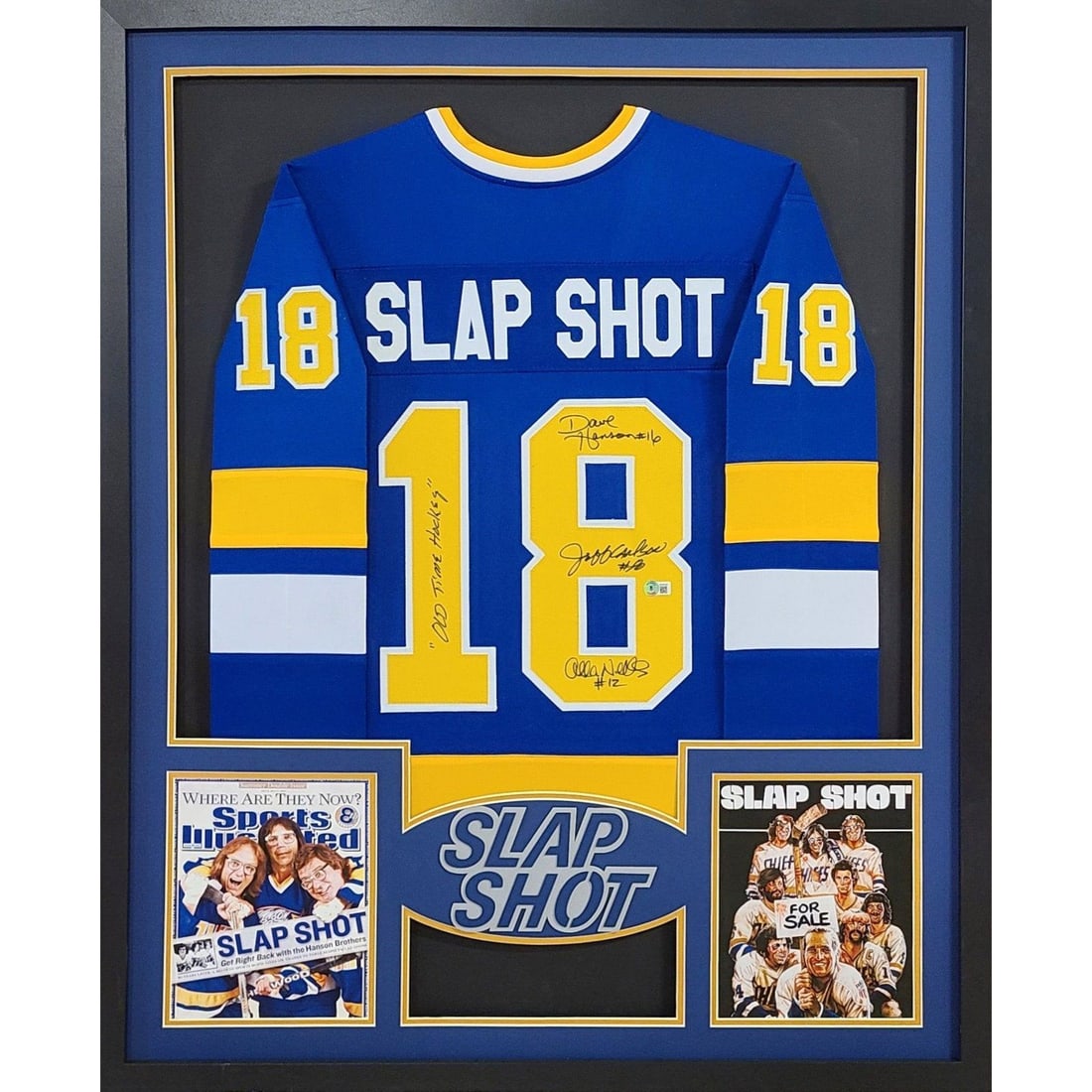 Slap Shot Framed Jersey Signed by Hanson Brothers Beckett Authenticated: Slap Shot Framed Jersey Signed by Hanson Brothers Beckett Authenticated This autographed framed jersey features the iconic Slap Shot Hanson Brothers, signed by Dave Hanson, Steve Carlson, and Jeff Car