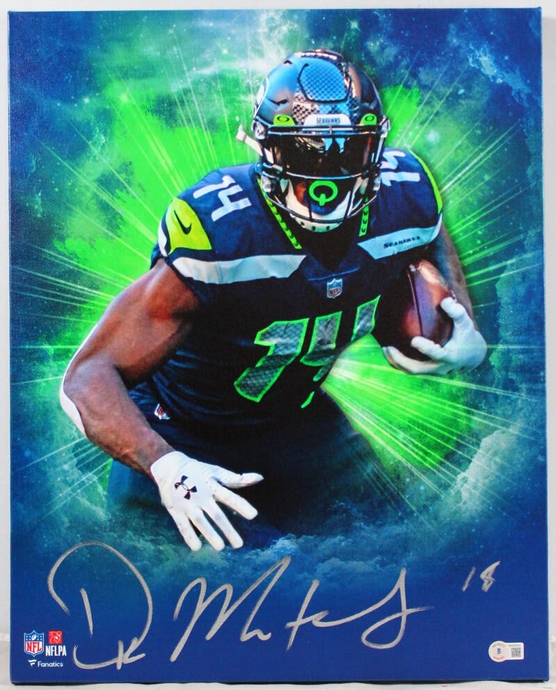 DK Metcalf Signed Seattle Seahawks 16x20 Canvas Photo Beckett Authenticated: DK Metcalf Signed Seattle Seahawks 16x20 Canvas Photo Beckett Authenticated This striking framed 16x20 stretched canvas features DK Metcalf, a standout player for the Seattle Seahawks. The photo