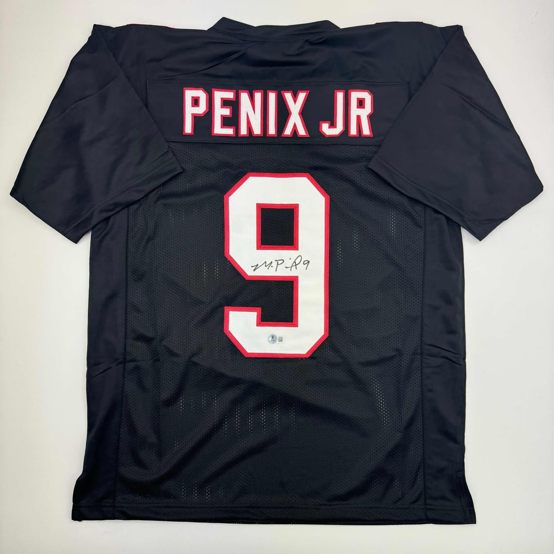 Autographed Michael Penix Jr. Atlanta Falcons Football Jersey Beckett Certified: Autographed Michael Penix Jr. Atlanta Falcons Football Jersey Beckett Certified This autographed Michael Penix Jr. Atlanta Falcons black football jersey is a unique collectible for fans and collectors
