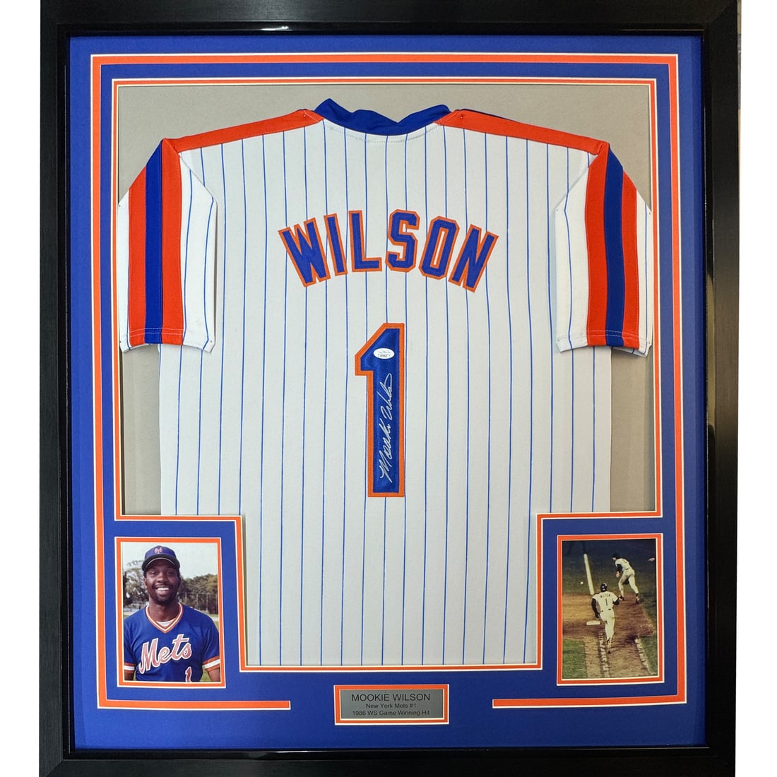 Framed Autographed Mookie Wilson New York Mets Jersey JSA COA: Framed Autographed Mookie Wilson New York Mets Jersey JSA COA This framed autographed jersey commemorates the legendary Mookie Wilson of the New York Mets. The jersey features a classic pinstripe desi