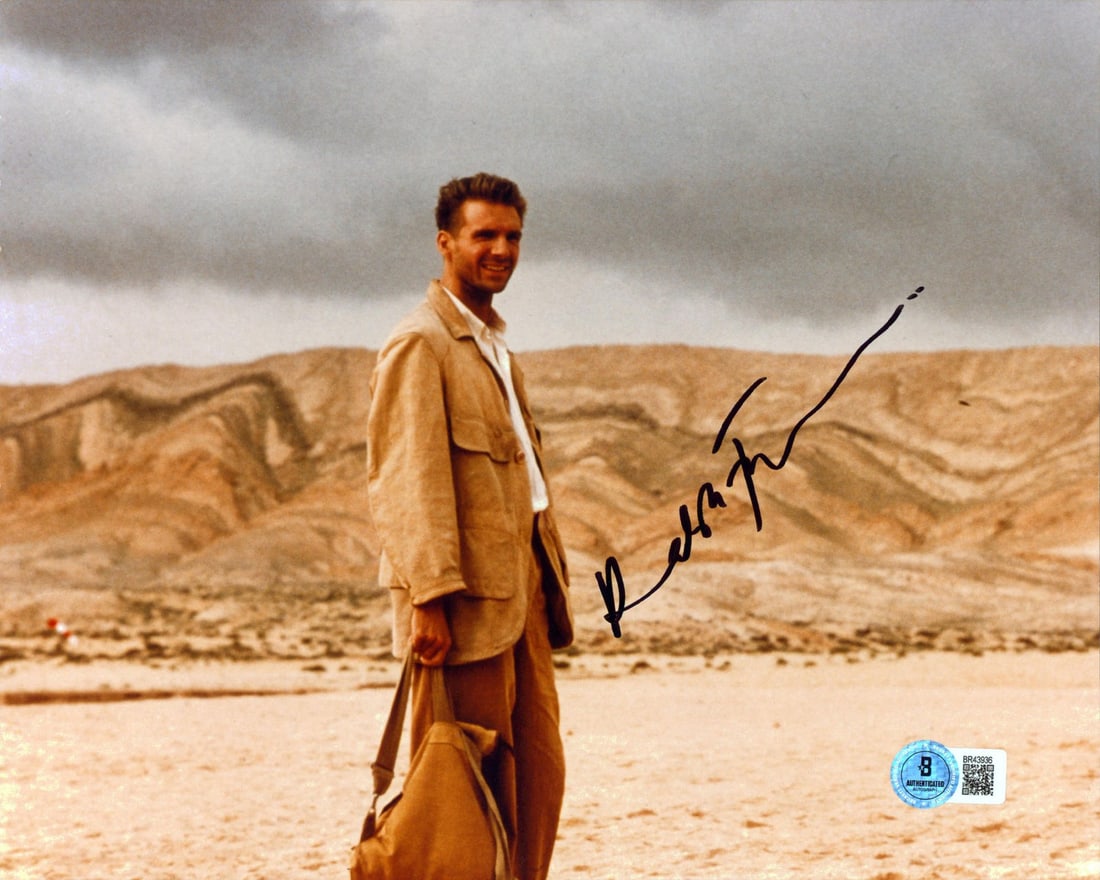 Ralph Fiennes Signed 8x10 Photo The English Patient Beckett Authenticated: Ralph Fiennes Signed 8x10 Photo The English Patient Beckett Authenticated This authentic 8x10 photograph features the signature of Ralph Fiennes from the acclaimed film 'The English Patient'. The phot