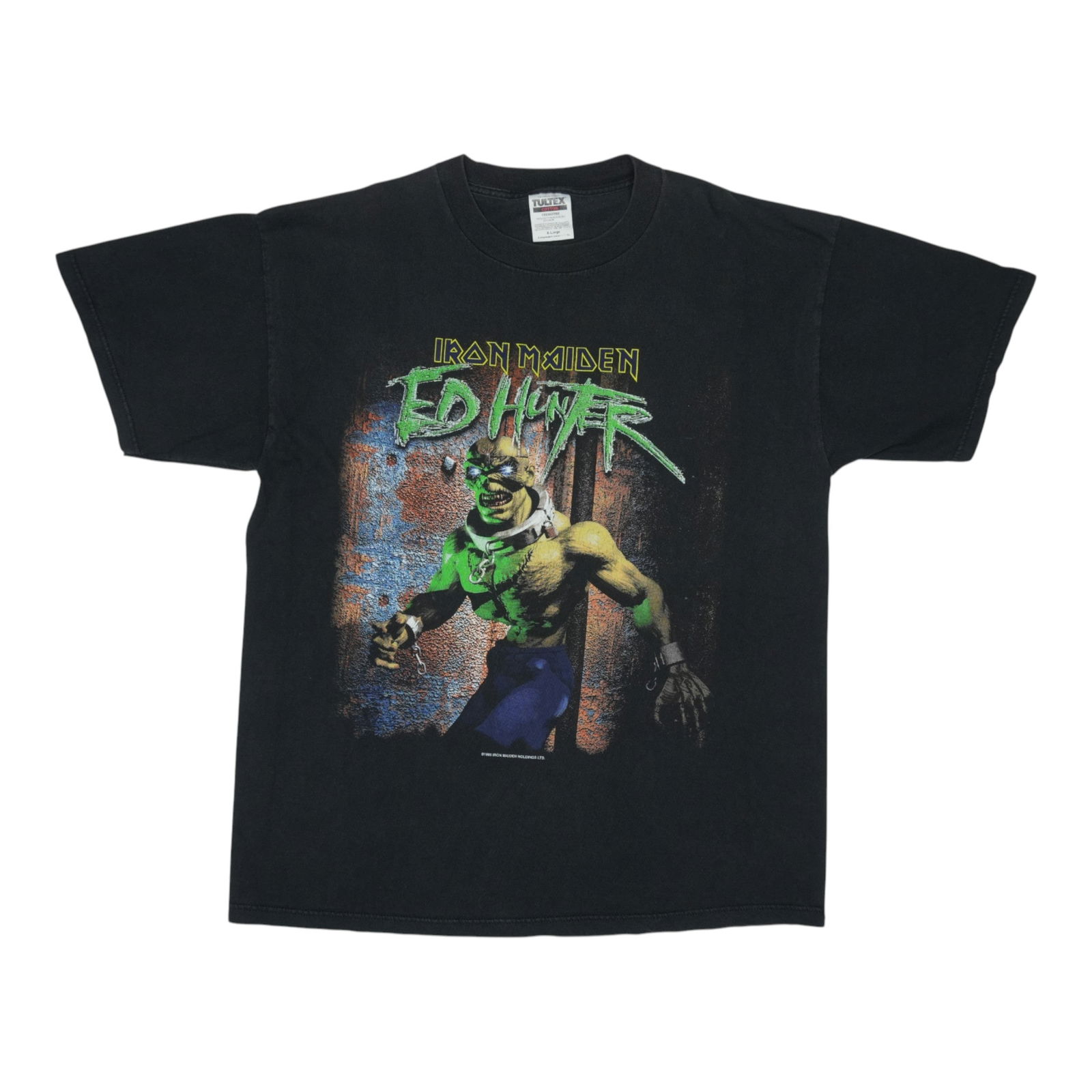 Vintage 1999 Ed Hunter Tour Black Shirt by Iron Maiden: Vintage 1999 Ed Hunter Tour Black Shirt by Iron Maiden This is an original vintage 1999 Iron Maiden Ed Hunter Tour Shirt featuring graphics on both the front and back. Made from 100% cotton, the shirt