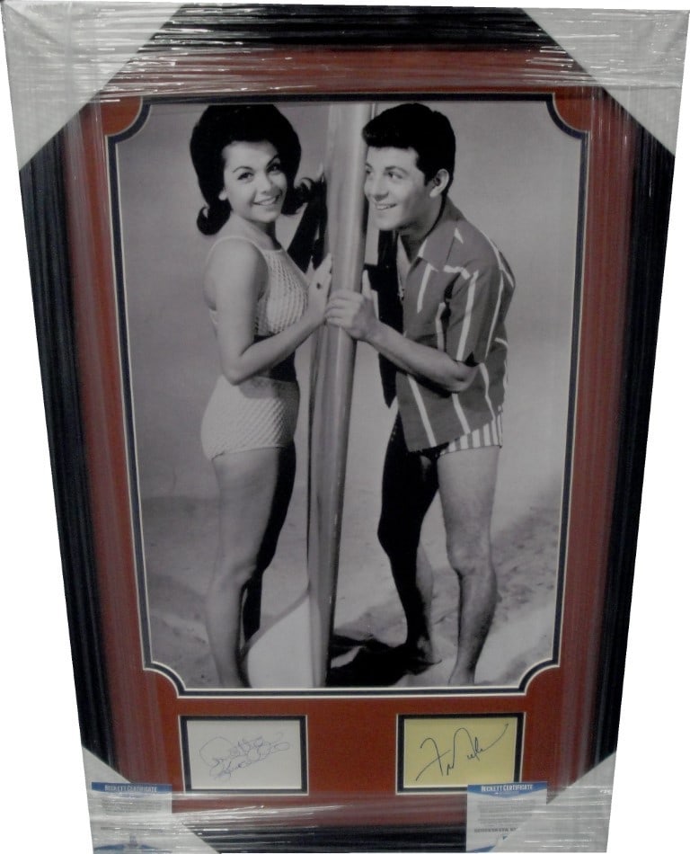 Annette Funicello Frankie Avalon Signed Photo Framed with Beach Party Scene: Annette Funicello Frankie Avalon Signed Photo Framed with Beach Party Scene This stunning framed piece features autographs from iconic stars Annette Funicello and Frankie Avalon, known for their class