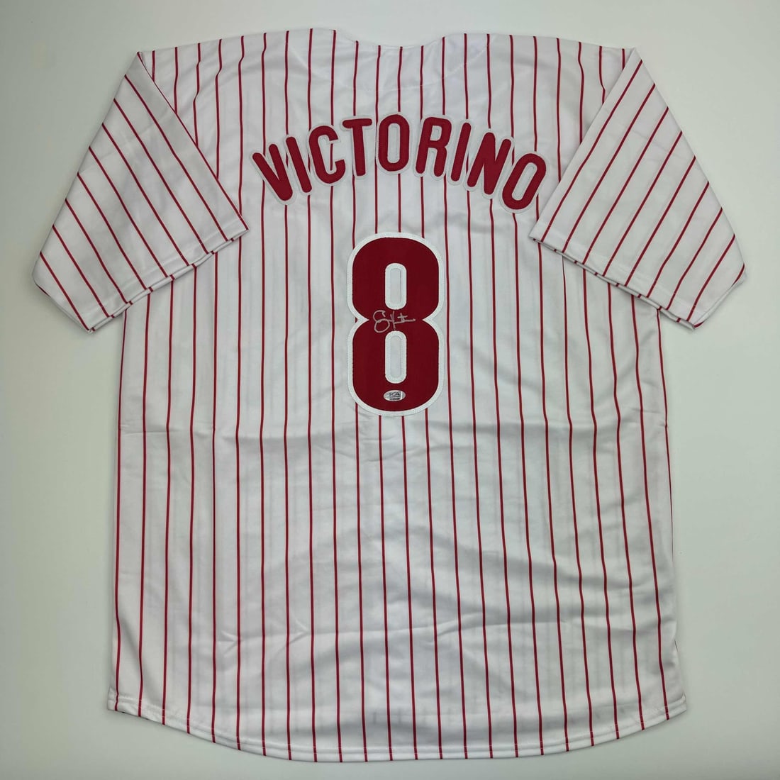 Shane Victorino Autographed Pinstripe Jersey JSA Authenticated Philadelphia Phillies: Shane Victorino Autographed Pinstripe Jersey JSA Authenticated Philadelphia Phillies Celebrate the legacy of Shane Victorino with this autographed Philadelphia Pinstripe Jersey, complete with a PSA Ce