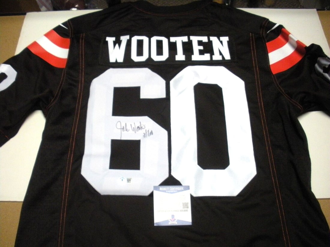 John Wooten Cleveland Browns Signed Nike Jersey with Beckett COA: John Wooten Cleveland Browns Signed Nike Jersey with Beckett COA This is an official licensed Nike jersey of John Wooten, a notable player from the Cleveland Browns, featuring his authentic signature.