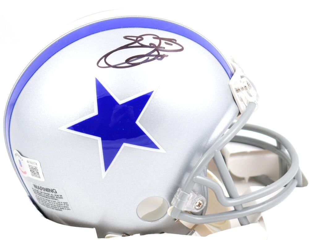 Emmitt Smith Autographed Dallas Cowboys Mini Helmet Beckett Certified: Emmitt Smith Autographed Dallas Cowboys Mini Helmet Beckett Certified This is an original mini helmet featuring the autograph of Emmitt Smith, a legendary player for the Dallas Cowboys. The helmet is