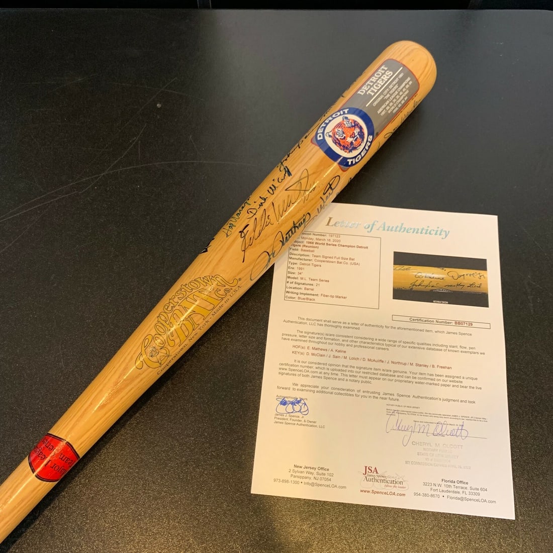 1968 Detroit Tigers Team Signed Bat JSA Authenticated: 1968 Detroit Tigers Team Signed Bat JSA Authenticated Celebrate the legacy of the 1968 Detroit Tigers with this authentic team-signed bat, featuring signatures from key players, including Yogi Berra.