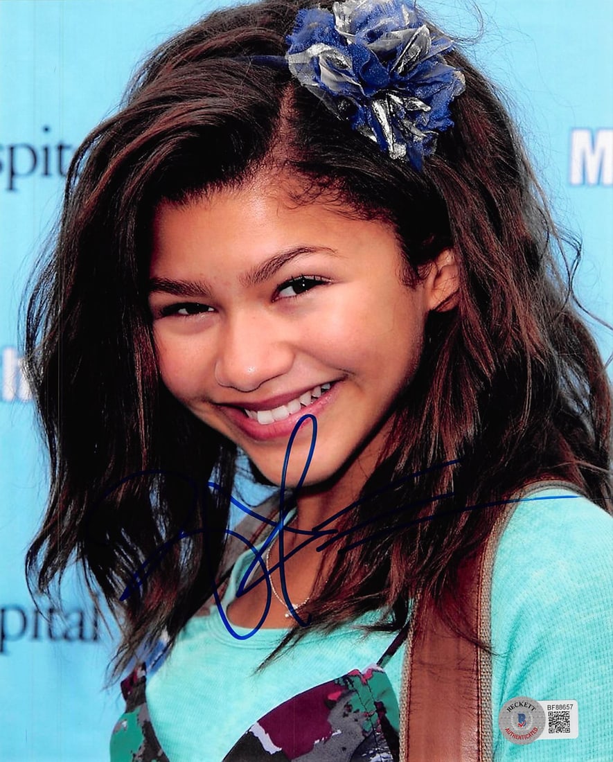 Zendaya Signed Spider-Man No Way Home 8x10 Photo Beckett Authenticated: Zendaya Signed Spider-Man No Way Home 8x10 Photo Beckett Authenticated This authentic 8x10 photograph features Zendaya, personally signed from her role in Spider-Man: No Way Home. The autograph has be