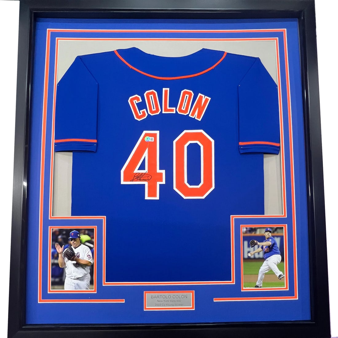 Framed Bartolo Colon Autographed Jersey New York Mets BAS COA: Framed Bartolo Colon Autographed Jersey New York Mets BAS COA Celebrate the legacy of Bartolo Colon with this professionally framed and autographed New York Mets jersey. This striking blue jersey feat