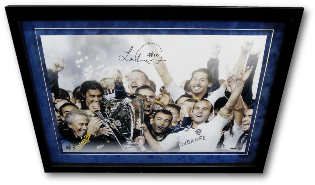 Landon Donovan Signed 16x24 Photo Framed with Upper Deck Authentication: Landon Donovan Signed 16x24 Photo Framed with Upper Deck Authentication This stunning 16x24 photo features Landon Donovan, one of soccer's greatest players, beautifully custom framed with a floating m