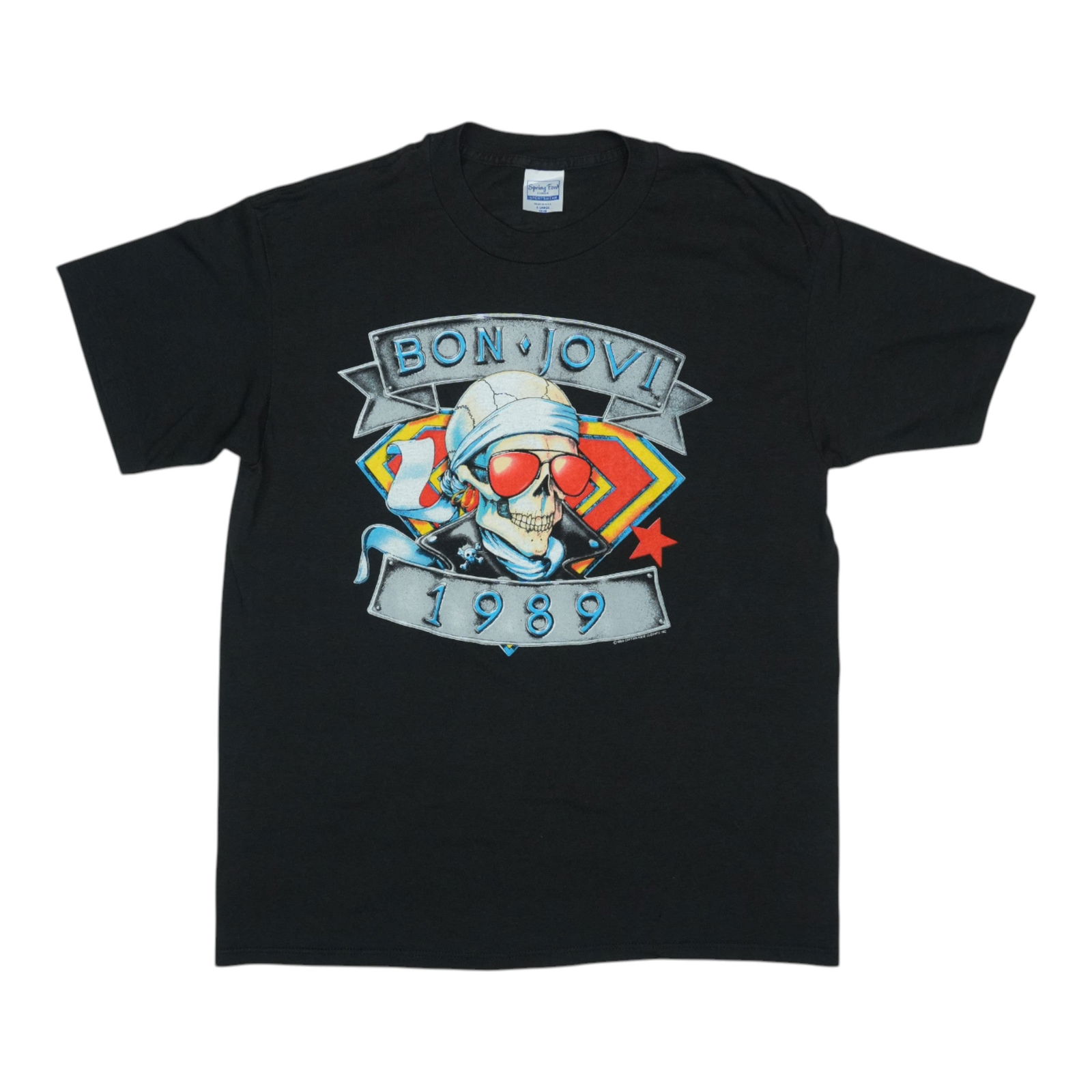 Vintage 1989 Bon Jovi We're Back Concert Graphic T Shirt: Vintage 1989 Bon Jovi We're Back Concert Graphic T Shirt This is an original vintage 1989 Bon Jovi "We're Back Kickin Ass" shirt featuring both front and back graphics. Made from a 50/50 polyester and