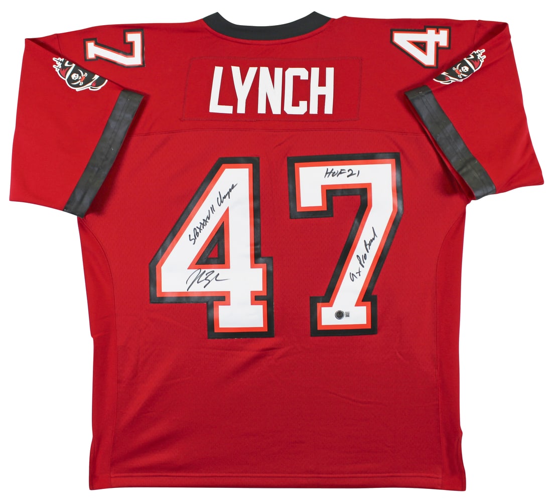 John Lynch Signed Red Buccaneers Jersey with HOF Inscription BAS Authenticated: John Lynch Signed Red Buccaneers Jersey with HOF Inscription BAS Authenticated Celebrate the legacy of John Lynch with this original Tampa Bay Buccaneers jersey. This striking red Mitchell & Ness 2002