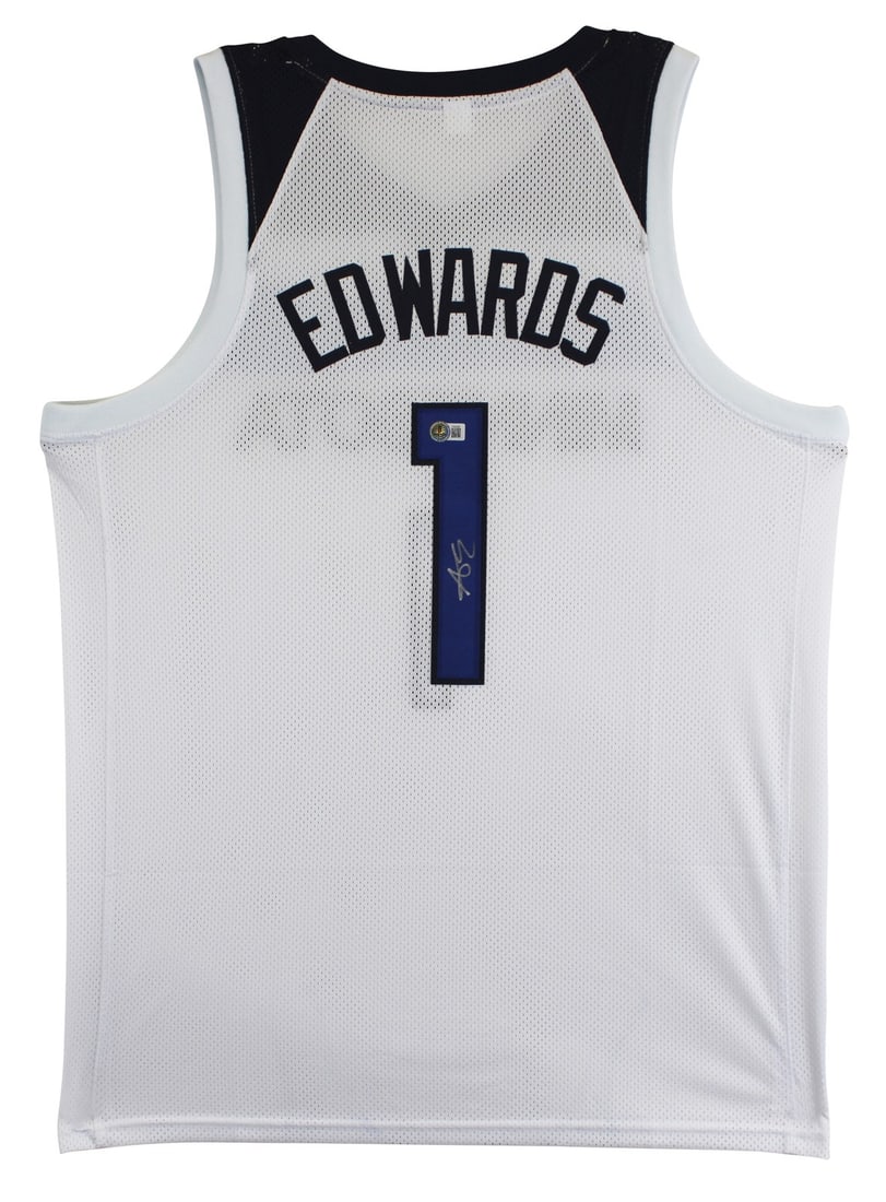 Autographed Anthony Edwards White Jersey Beckett Authenticated Minnesota Timberwolves: Autographed Anthony Edwards White Jersey Beckett Authenticated Minnesota Timberwolves This white pro style jersey has been personally signed by Anthony Edwards of the Minnesota Timberwolves. The jerse