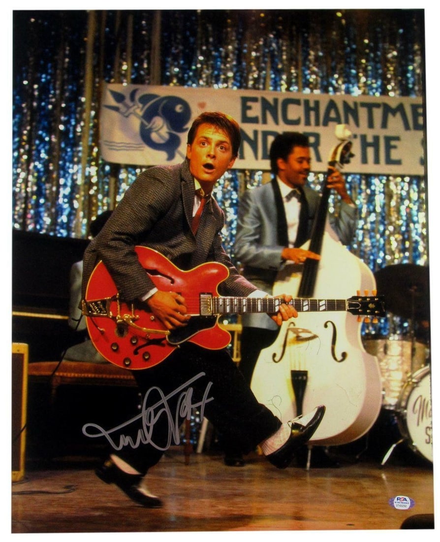 Michael J Fox 16x20 Autographed Back to the Future Photo PSA/DNA: Michael J Fox 16x20 Autographed Back to the Future Photo PSA/DNA This is a Michael J. Fox signed 16x20 photo from the iconic film "Back to the Future." The autograph has been authenticated by PSA/DNA,