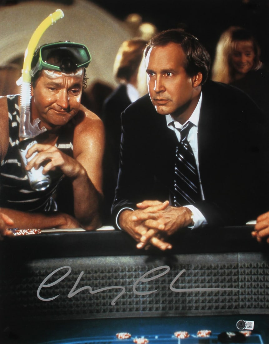 Chevy Chase Signed 16x20 Photo National Lampoon Vegas Vacation BAS Witnessed: Chevy Chase Signed 16x20 Photo National Lampoon Vegas Vacation BAS Witnessed This striking 16x20 vertical photograph captures Chevy Chase as seen in National Lampoon's Vegas Vacation, personally signe