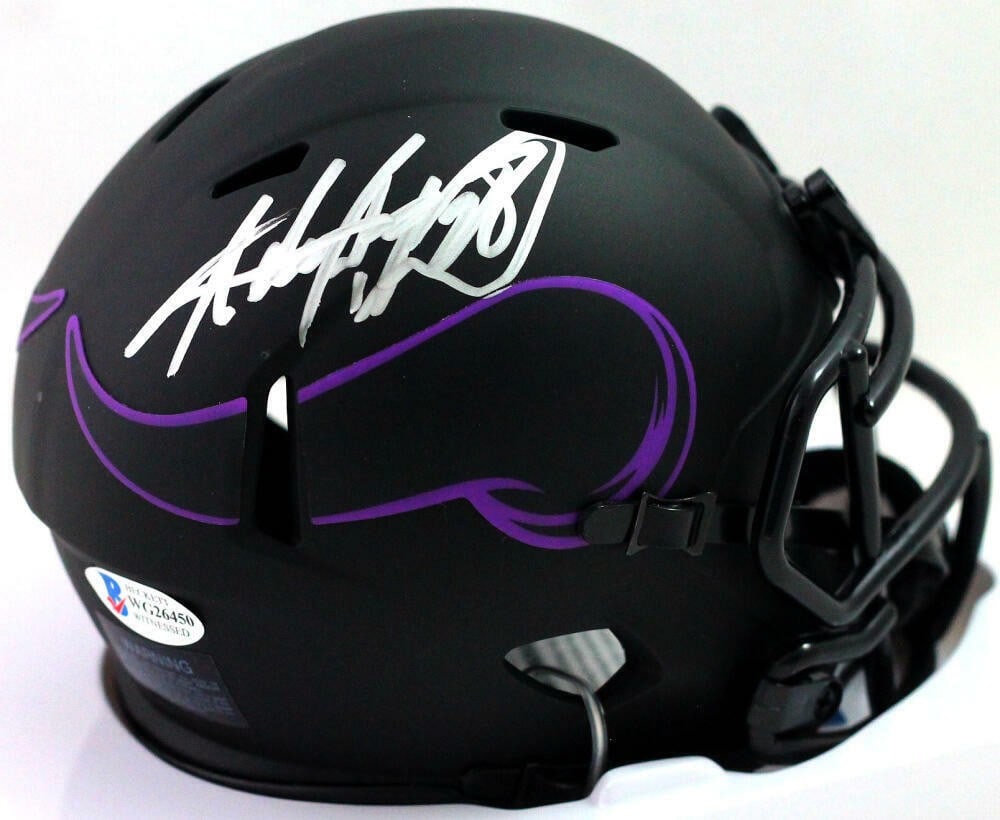 Adrian Peterson Signed Minnesota Vikings Eclipse Mini Helmet Beckett Authentication: Adrian Peterson Signed Minnesota Vikings Eclipse Mini Helmet Beckett Authentication This is an original Minnesota Vikings Eclipse Mini Helmet, autographed by the legendary player Adrian Peterson. The