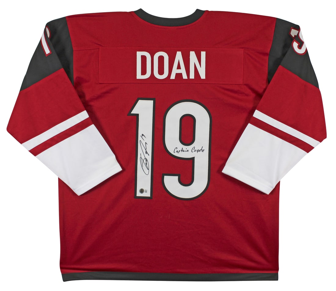 Shane Doan Signed Arizona Coyotes Maroon Jersey Captain Coyote BAS Authenticated: Shane Doan Signed Arizona Coyotes Maroon Jersey Captain Coyote BAS Authenticated This is an original autographed maroon Pro Style jersey from Shane Doan, famously known as "Captain Coyote" of the Ariz