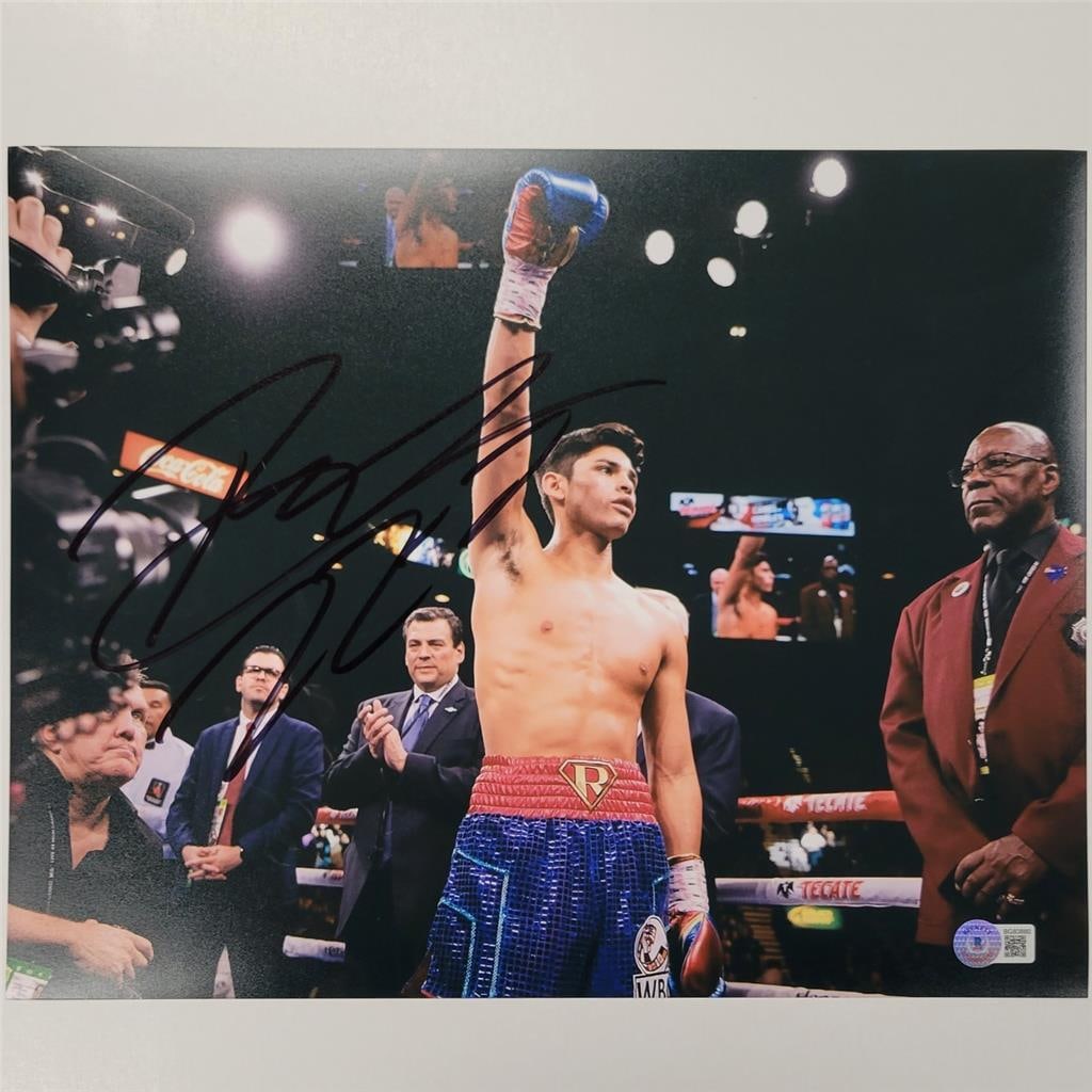 Ryan Garcia Signed 11x14 Photo 22-0 Beckett BAS Authentic Boxing Memorabilia: Ryan Garcia Signed 11x14 Photo 22-0 Beckett BAS Authentic Boxing Memorabilia This is an original signed 11x14 photo of boxer Ryan Garcia, who boasts an impressive record of 22 wins and no losses. The