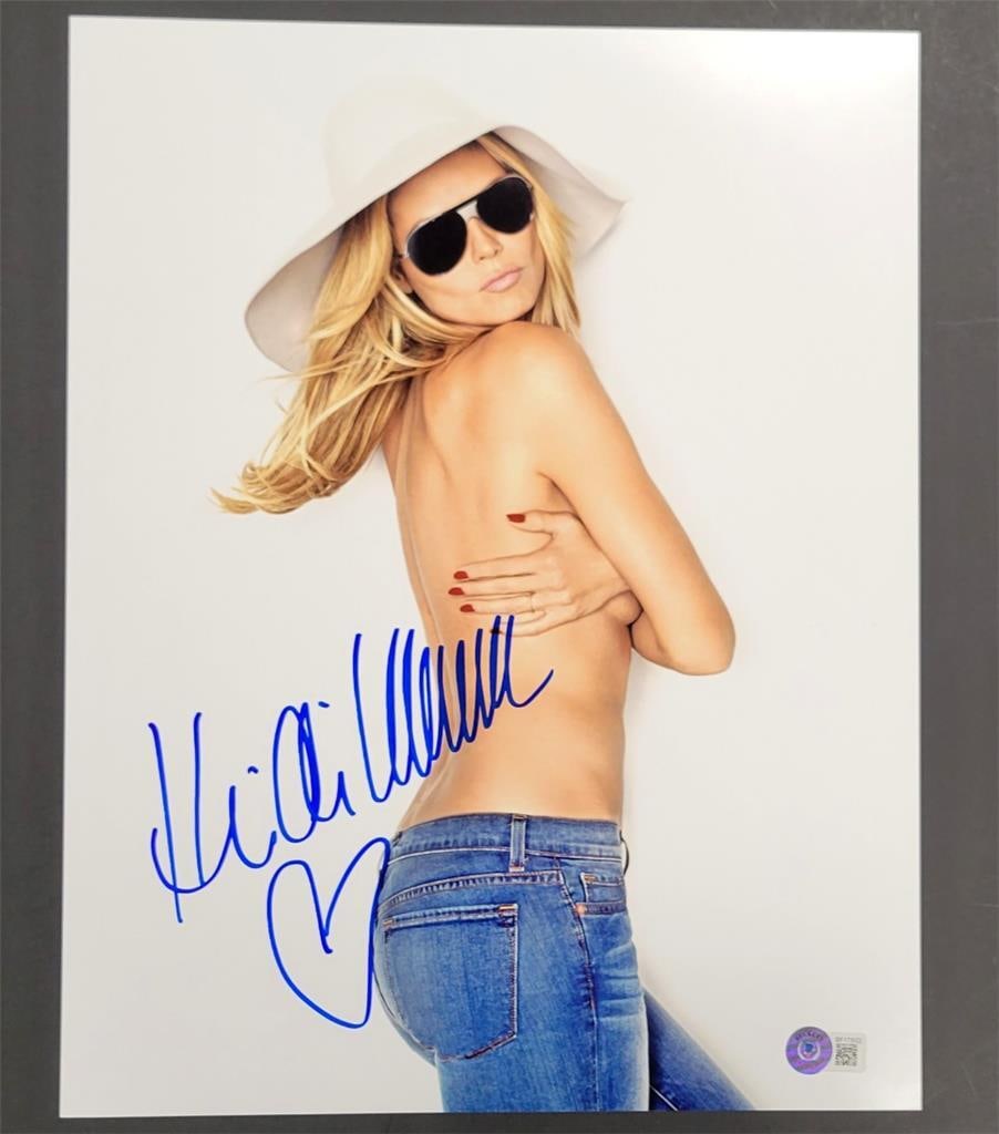 Heidi Klum Signed 11x14 Photograph Authenticated by Beckett: Heidi Klum Signed 11x14 Photograph Authenticated by Beckett This is an original 11x14 photograph featuring model Heidi Klum, autographed by her. The autograph is authenticated by Beckett, ensuring its