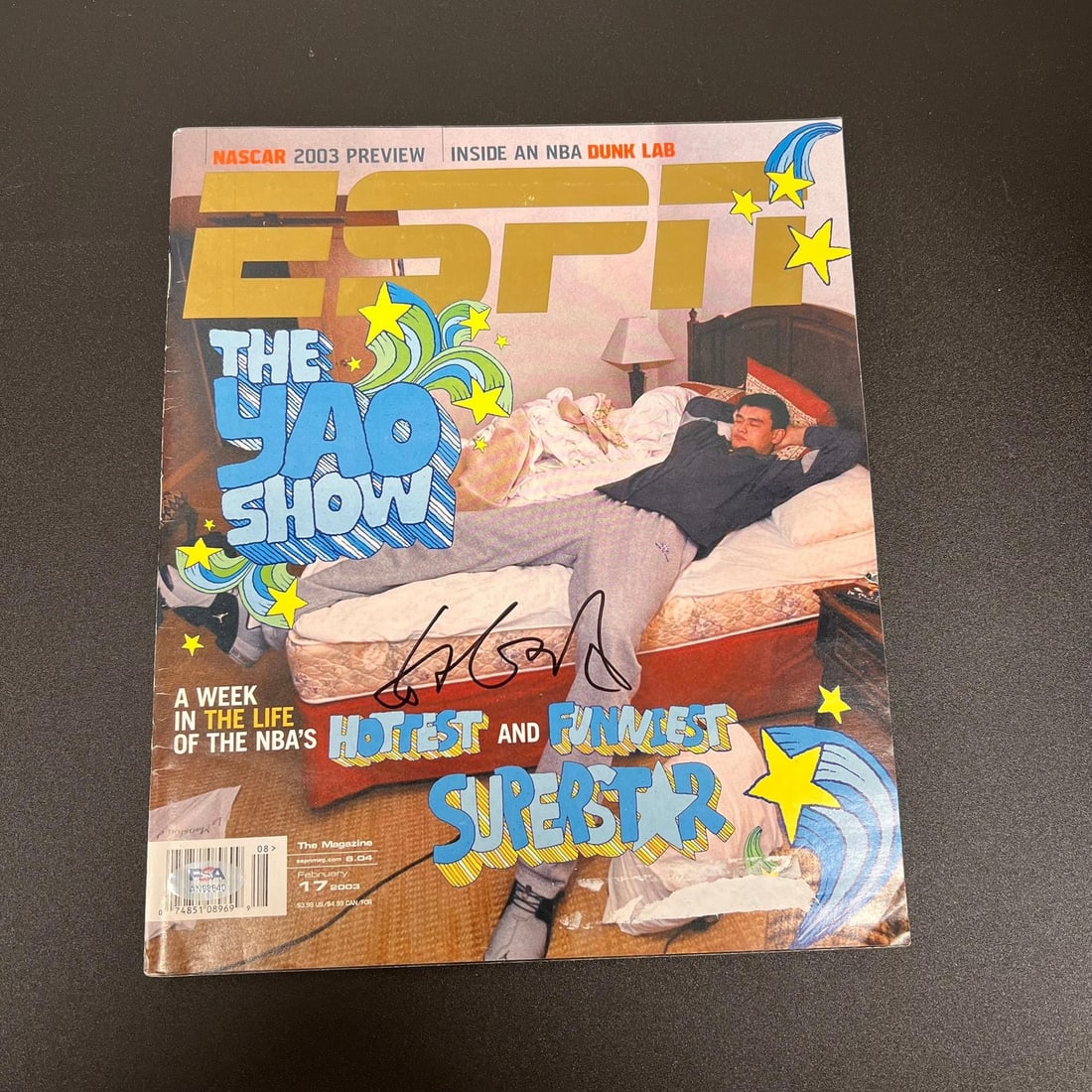 Yao Ming Autographed ESPN Magazine PSA/DNA Houston Rockets: Yao Ming Autographed ESPN Magazine PSA/DNA Houston Rockets This is an original ESPN magazine featuring Yao Ming, the legendary Houston Rockets player. The magazine is signed by Yao Ming himself, and t