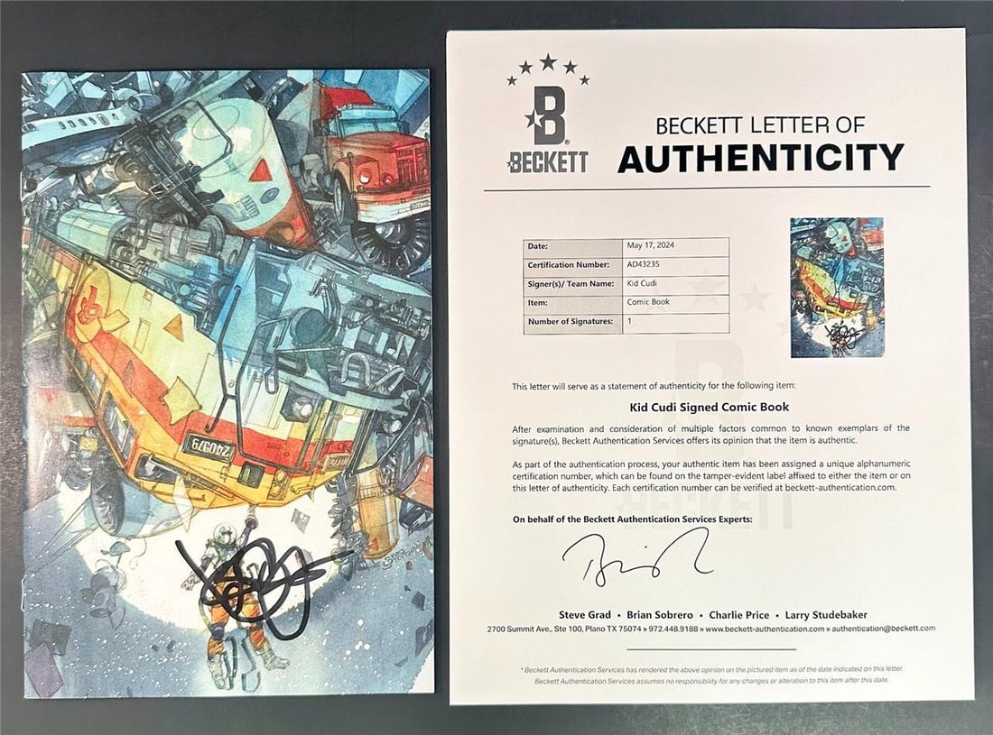 Kid Cudi Signed Moon Man Comic Book Issue #2 Beckett Authenticated: Kid Cudi Signed Moon Man Comic Book Issue #2 Beckett Authenticated This is an original Moon Man Comic Book Issue #2, featuring a signature from Kid Cudi on the cover. The autograph has been authentica