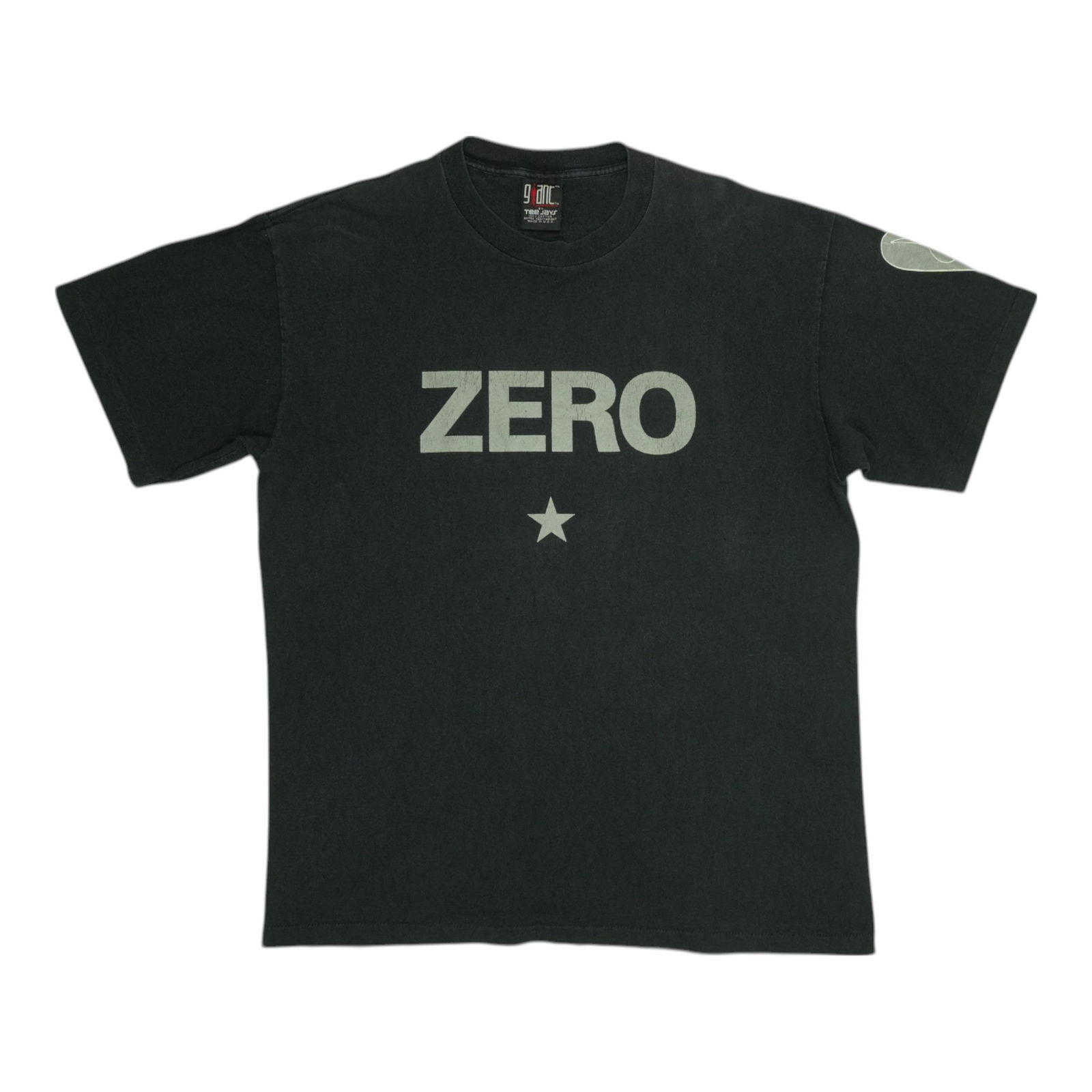 Vintage 1990s Smashing Pumpkins Zero Black Cotton Band T-Shirt: Vintage 1990s Smashing Pumpkins Zero Black Cotton Band T-Shirt This is an original vintage 1990s Smashing Pumpkins "Zero" shirt, featuring a black color and constructed from 100% cotton. It is a true