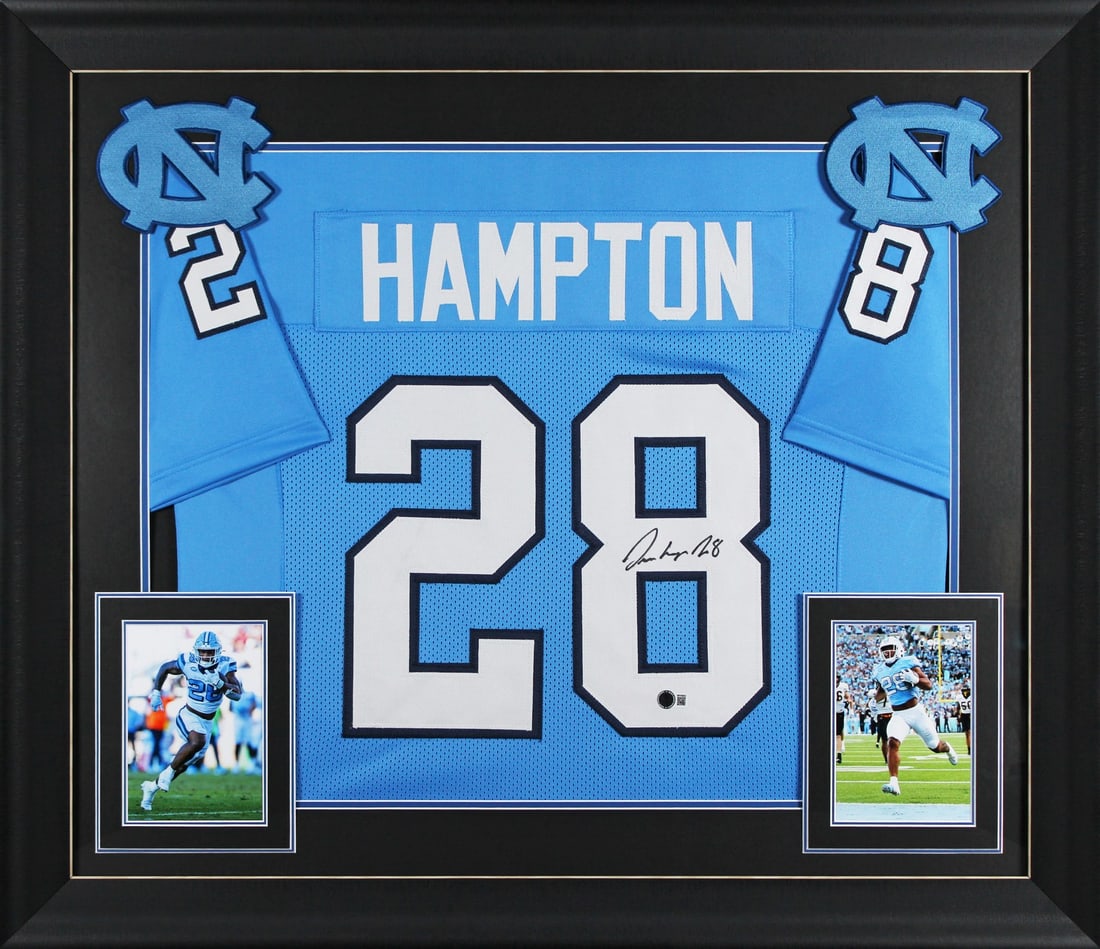 Omarion Hampton Signed Carolina Blue Pro Style Framed Jersey BAS Witnessed: Omarion Hampton Signed Carolina Blue Pro Style Framed Jersey BAS Witnessed This is a Carolina Blue Pro Style Framed Jersey personally signed by Omarion Hampton, star player for the North Carolina Tar
