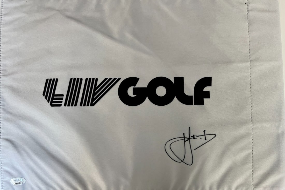 Cam Smith 2023 LIV Golf Signed Pin Flag JSA Authenticated: Cam Smith 2023 LIV Golf Signed Pin Flag JSA Authenticated This is an officially licensed LIV Golf pin flag autographed by superstar golfer Cam Smith. The signature has been authenticated by James Spen