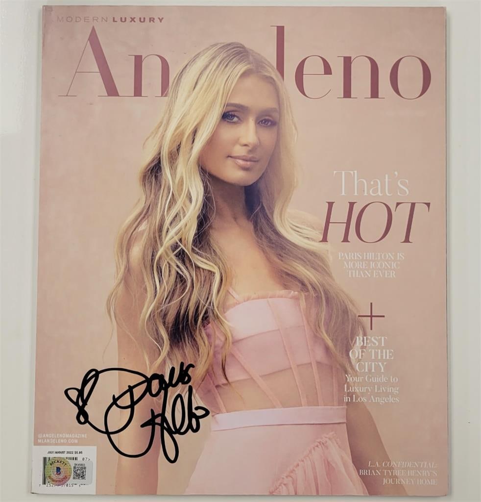 Paris Hilton Signed Angeleno Magazine Authenticated by Beckett: Paris Hilton Signed Angeleno Magazine Authenticated by Beckett This is an original Angeleno Magazine featuring a signature from Paris Hilton, authenticated by Beckett. The magazine is a unique collect