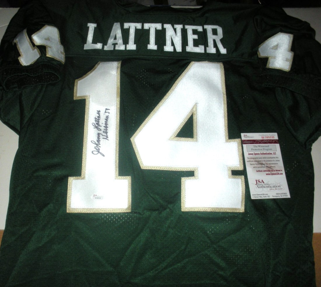 Johnny Lattner Notre Dame Reebok Jersey with JSA COA: Johnny Lattner Notre Dame Reebok Jersey with JSA COA Celebrate the legacy of Johnny Lattner with this officially licensed Reebok jersey, signed by the Notre Dame football star. This collectible item i