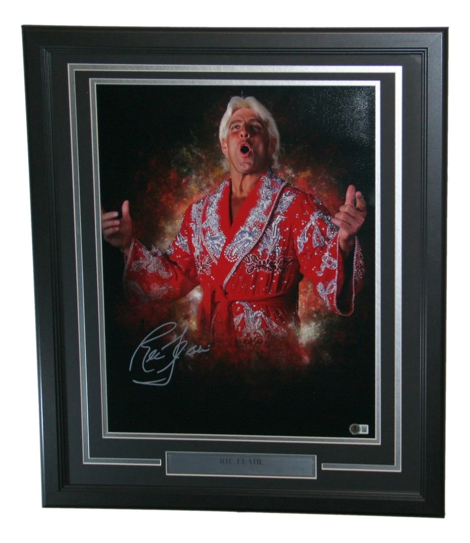 Ric Flair Signed Framed 16x20 Photo BAS Certified: Ric Flair Signed Framed 16x20 Photo BAS Certified This is a stunning autographed framed 16x20 photo of the iconic Ric Flair, famously known as "The Nature Boy." The photo is authenticated by Beckett A