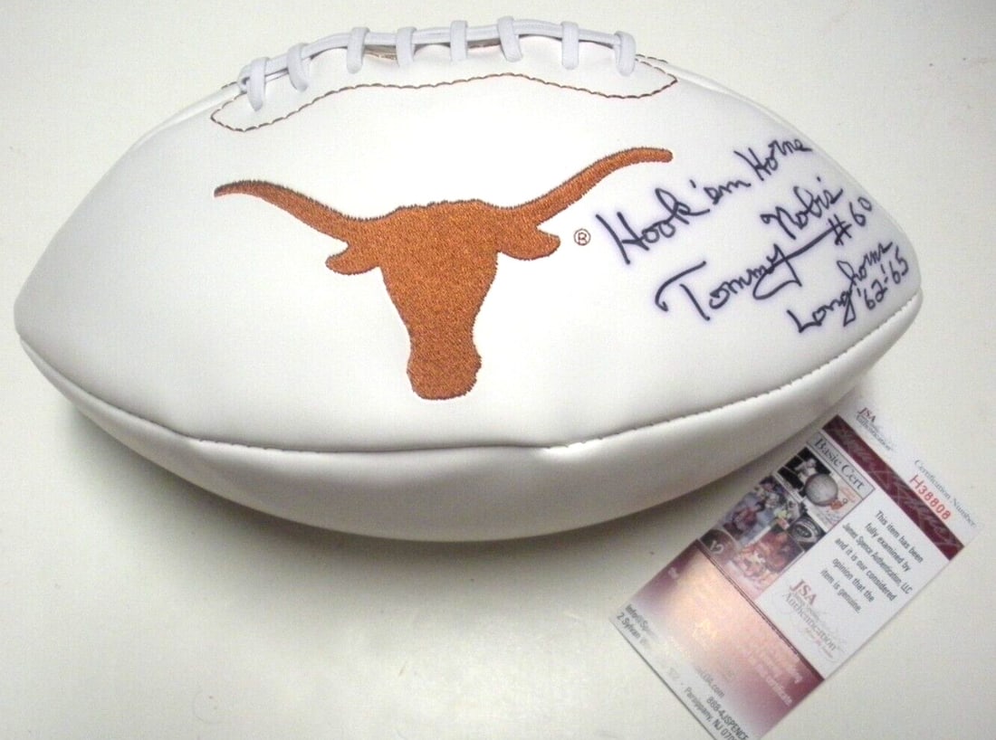 Texas Longhorns Signed Football JSA COA Hook Em Horns: Texas Longhorns Signed Football JSA COA Hook Em Horns This is an authentic signed football featuring the Texas Longhorns logo and the iconic 'Hook Em Horns' phrase. It comes with a JSA Certificate of